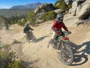 Rider on the electric dirt bike tour on a rocky trail above South Lake Tahoe