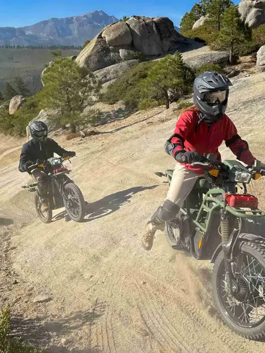 Riders on an electric dirt bike tour above South Lake Tahoe